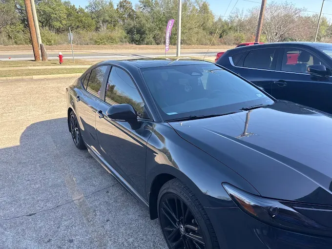 Sedan after window tinting and full auto detailing in Bryan, TX