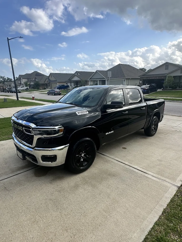 Black Ram 1500 with window tint parked in the Texas sun, benefits of window tinting in Bryan, TX