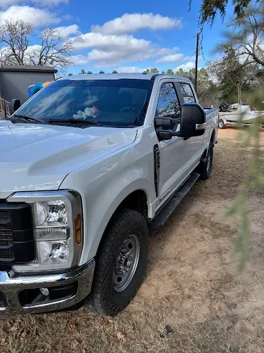 White truck with window tint at Shade-EZ, contact us for a free quote in Bryan, TX