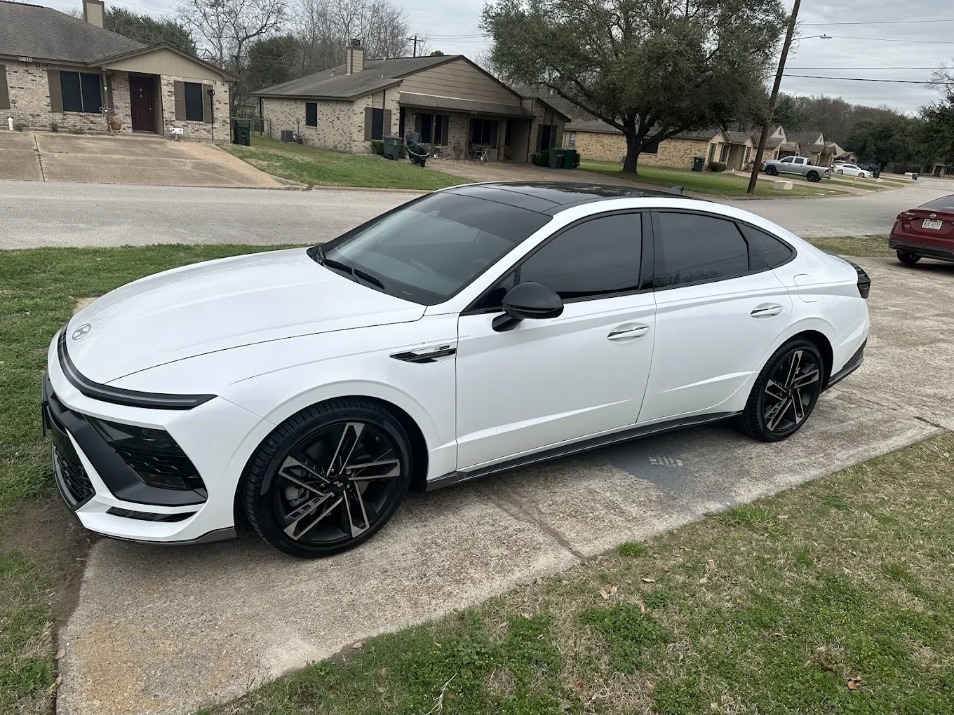 White Hyundai Sonata N Line with window tint, Bryan, TX