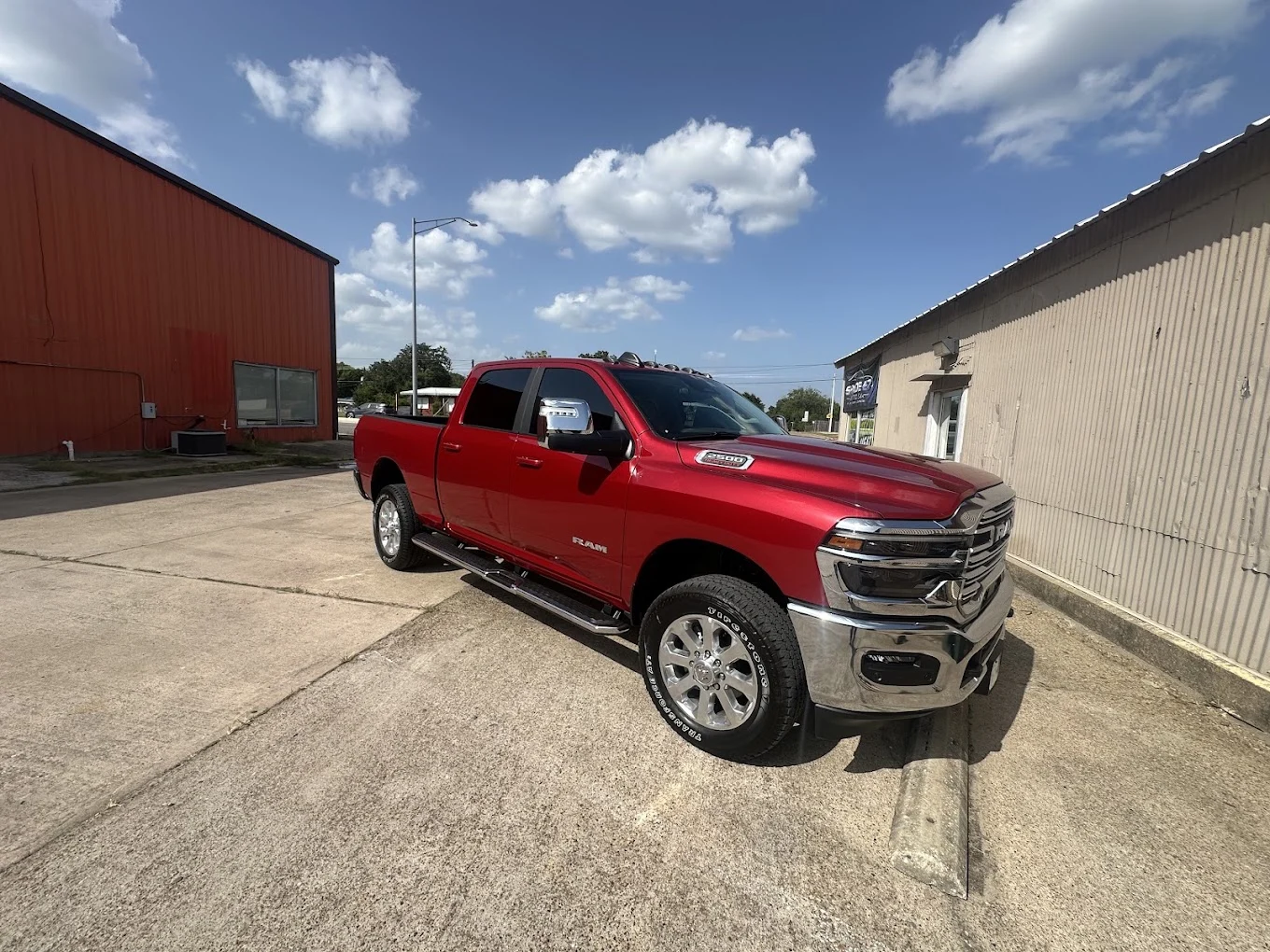 Red Ram 2500 with window tint built for Texas heat at Shade-EZ in Bryan, TX